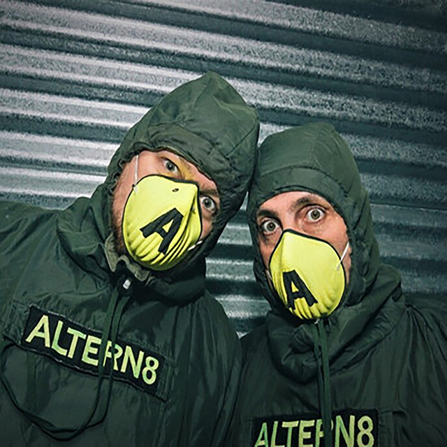Album cover of Frequency by Altern 8 - two men wearing hooded jackets and masks
